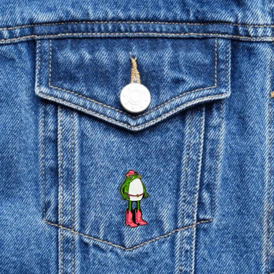 Pin Rana Vaquera con Sombrero y Botas