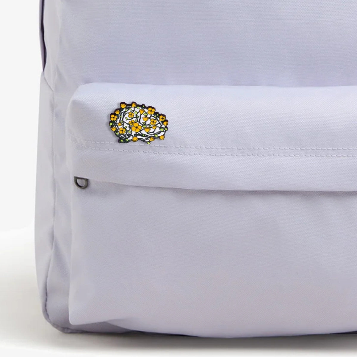 Pin Cerebro con flores amarillas