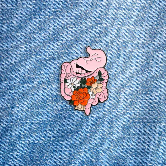 Pin Estómago con flores