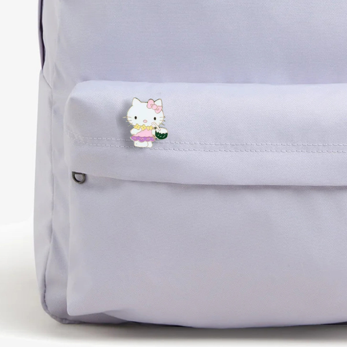 Pin Hello Kitty con jugo